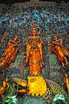 A colourful Buddhist statue at a temple in Hangzhou.